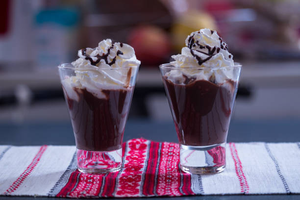 istock two glasses of chocolate with cream 1195380962