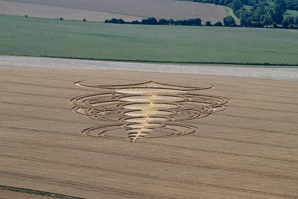 Crop circle in corn field. Wiltshire. England  crop circle stock pictures, royalty-free photos & images