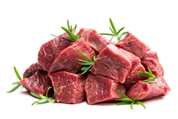 istock Sliced raw beef with rosemary herb isolated on white 1195384959