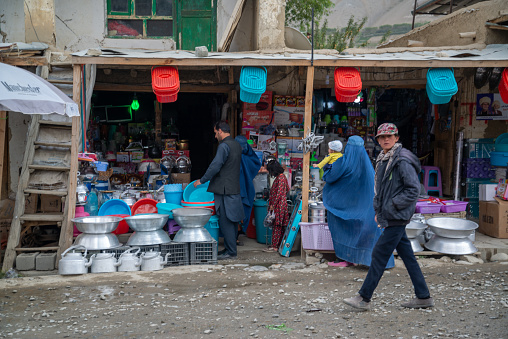 Eshkashem, Afghanistan, circa september 2019: People in Ishkashim city center market, Afghanistan.