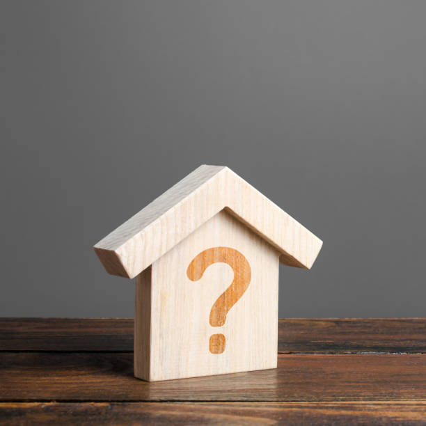 istock House with a question mark. Cost estimate. Solving housing problems, deciding buy or rent real estate. Search for options, choice type of residential buildings. Property price valuation evaluation 1195386070