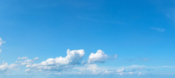 istock Soft white clouds against blue sky ,Panoramic fluffy clouds in the blue sky 1195390376