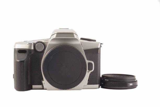 istock 35 mm analog camera on a white background. Film camera. 1195391397
