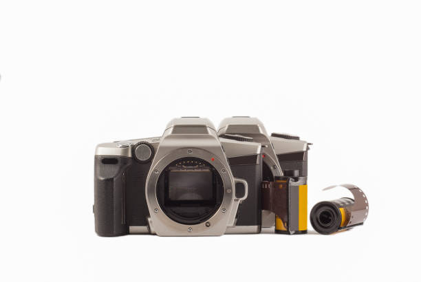 istock 35 mm analog camera on a white background. Film camera. 1195391434