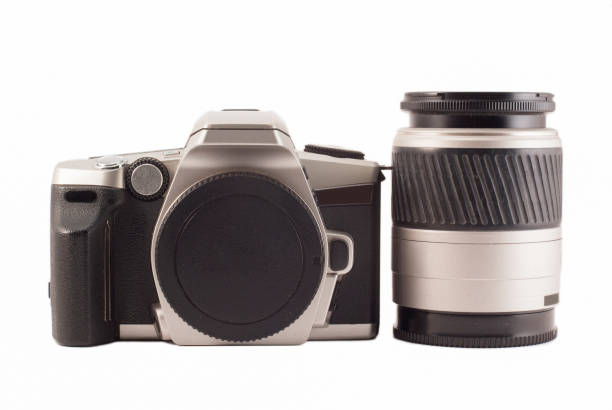 istock 35 mm analog camera on a white background. Film camera. 1195391494