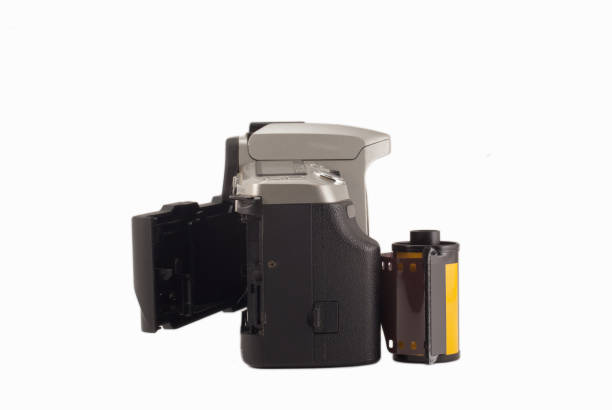 istock 35 mm analog camera on a white background. Film camera. 1195391521