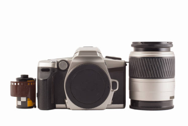 35 mm analog camera on a white background. Film camera.