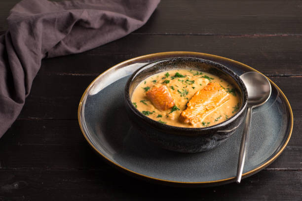 istock Salmon creame soupe in bowl 1195392895
