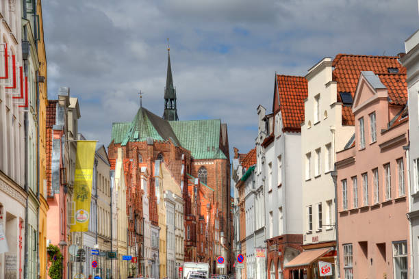 Lubeck, Germany - July 3, 2019: View of Katharinenkirche church and gables of historical houses in Lubeck, Germany on July 3, 2019