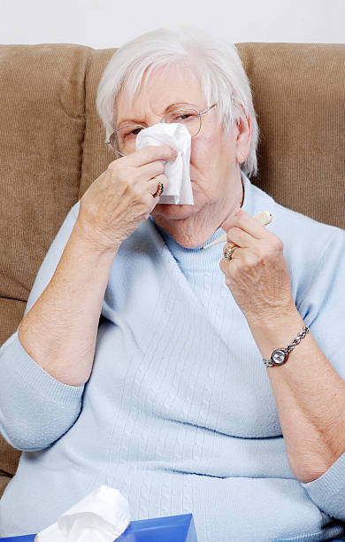istock closeup sick senior woman 119539989