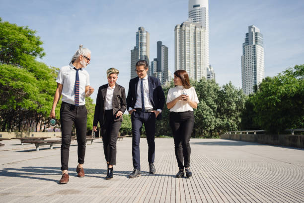 istock Latin business people going to work 1195400460