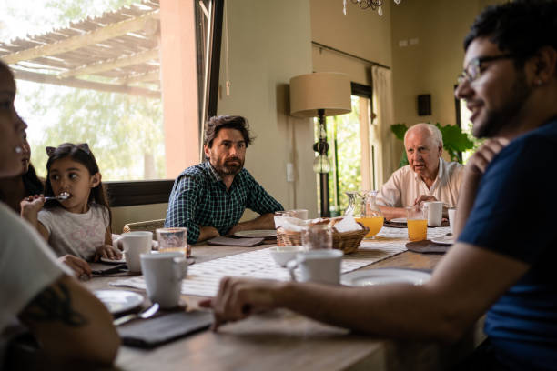 istock Latin family having breakfast together 1195400995