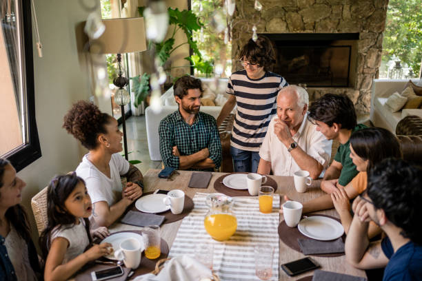 istock Casual conversation during family breakfast 1195401033