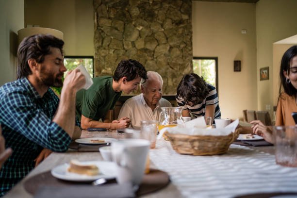 istock Grandpa learning how to use mobile phone 1195401256