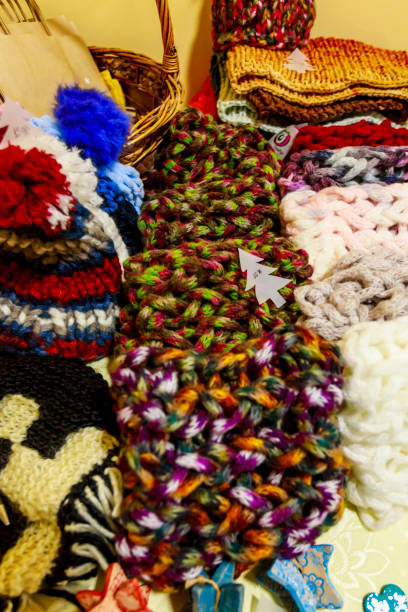 istock A pile of hand made winter shawls 1195403166