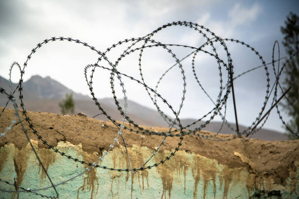 istock Barbed wire on the wall in Ishkashim, Afghanistan 1195404610
