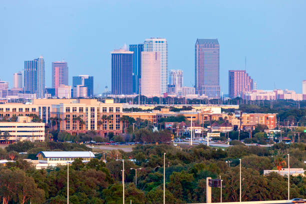 istock Tampa Florida Skyline looking East at sunset 1195408658