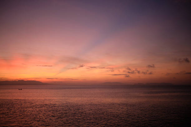 istock Sunrise across the Sea 1195410501