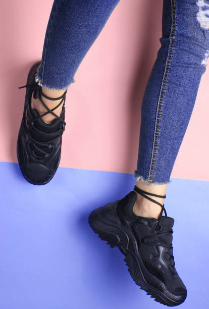 istock Leg in shoes 1195412550