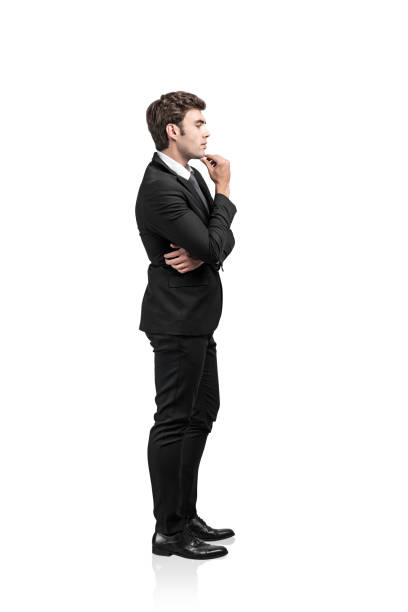istock Side view of thoughtful young businessman isolated 1195415068