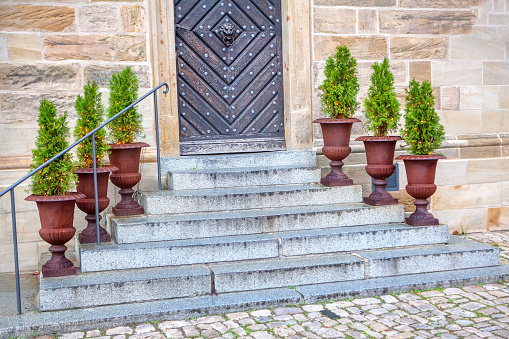 external staircases and entrance with flowerpots