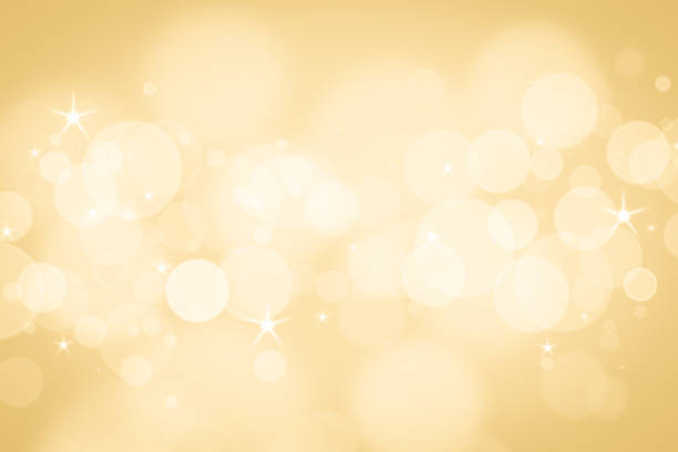 istock gold blur abstract background. bokeh christmas blurred beautiful shiny background lights 1195418535