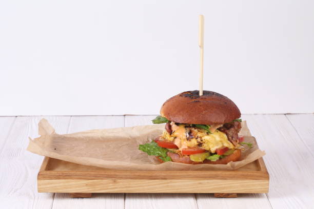 istock Grilled burger on a white background 1195418555
