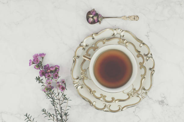 istock Breakfast table with cup of tea and Croissants. 1195422219