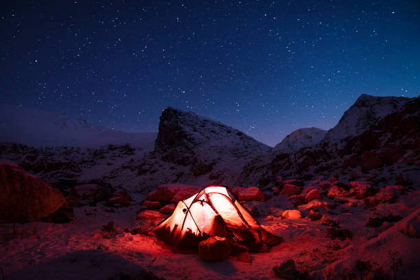 istock Camping at night with milky way 1195424042