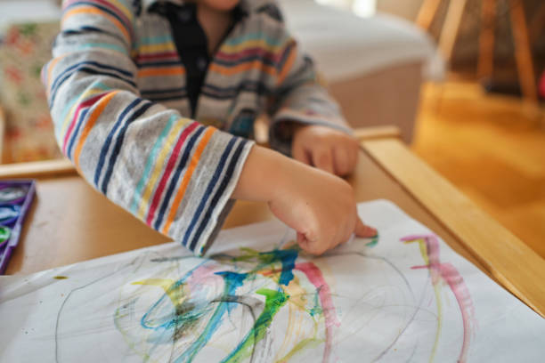 istock Child paint with watercolors. Children's creativity. 1195426799