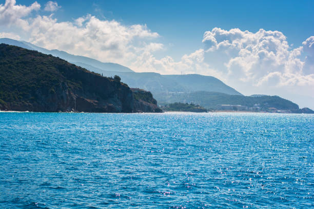 istock Idyllic image of peaceful sea and mountains in blue gradient color. 1195427770