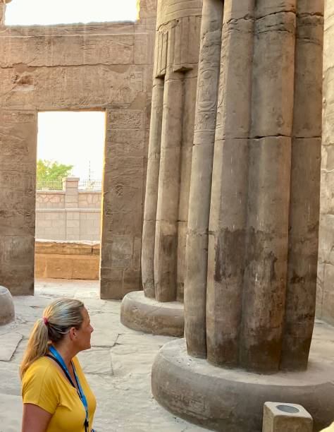 istock Solo Traveller viewing Egyptian temple 1195429604