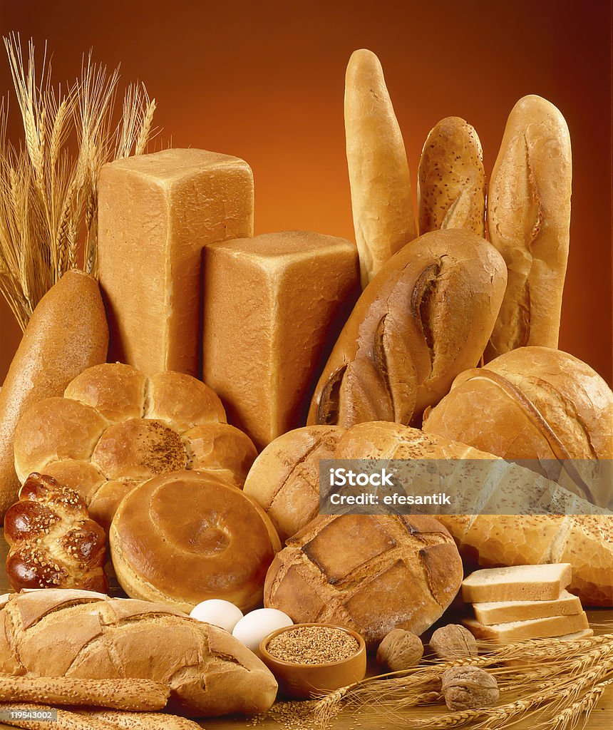 Lots of different types of freshly baked bread breads Baked Stock Photo