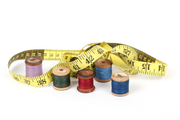 istock sewing items and tape measure isolated on a white background 1195431195