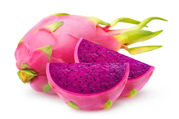 Isolated dragon fruit. Red fleshed pitahaya wedges and whole fruit isolated on white background with clipping path