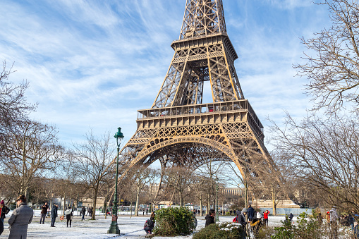 Looking up the Eiffel Tower into the clouds