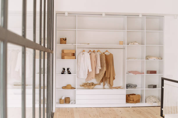 istock Cupboard with Clothes and Shoes, Hat and Scarf 1195447664