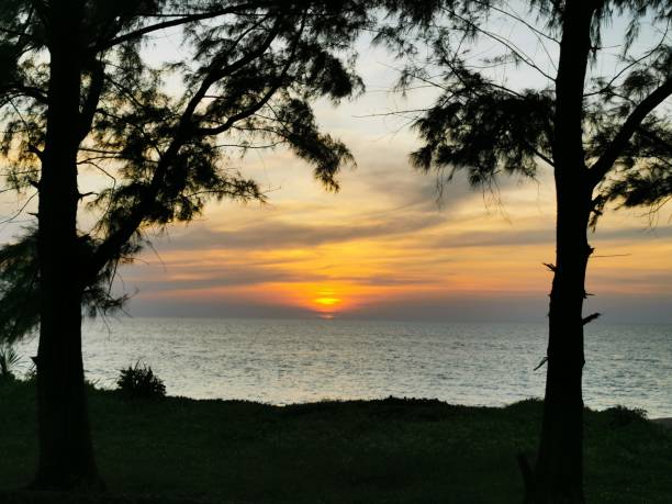 istock Sunset at the beach Phuket Island Thailand 1195452270
