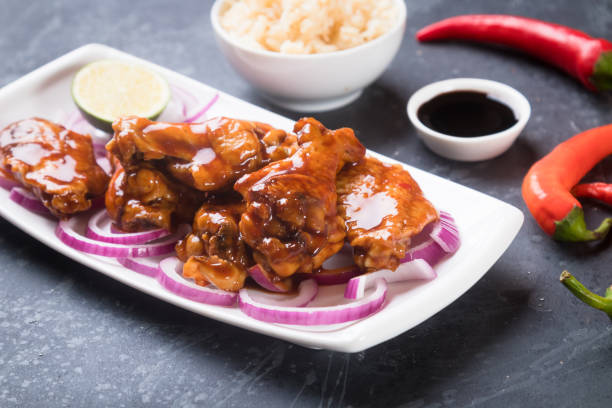 istock Asian spicy chicken wings 1195453159