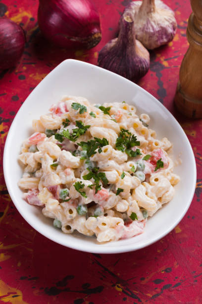 istock Homemade macaroni salad with vegetables 1195459011