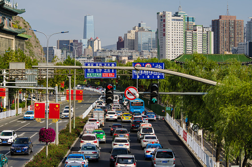 Traffic jam in Chinese City of Lanzhou in Gansu province. This particular street is part of the famous Silk Road. Photo taken from pedestrian bridge.
