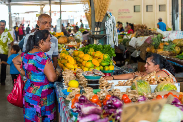 People in the local market, Fiji. With selective focus. stock photo