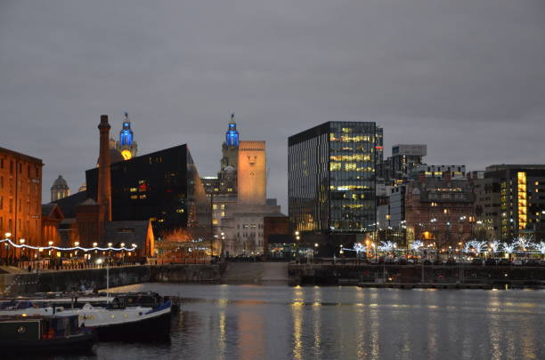 istock cityscape and albert docks by night in liverpool 1195480462