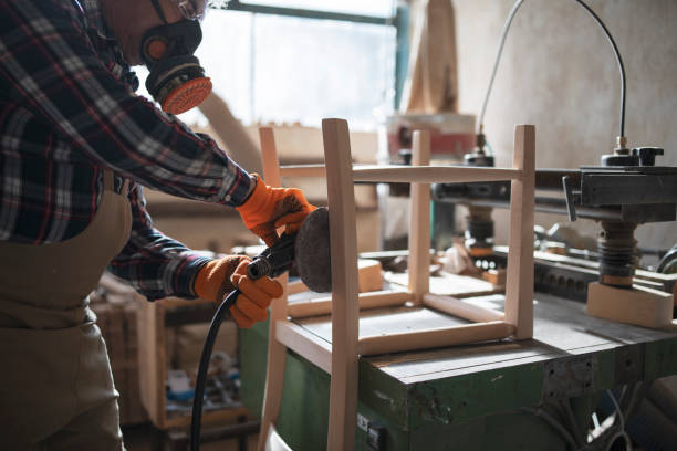 istock Carpenter Making Wooden Chair. 1195481383