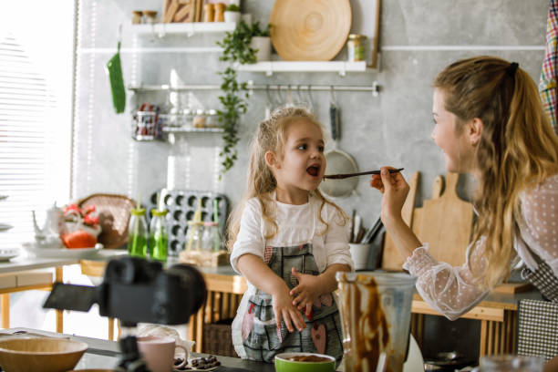 istock Taste testing a delicious dessert they are making together 1195481595