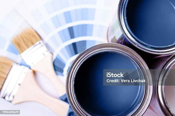 Paint Brushes Placed On Top Of Can Filled With Blue Paint Classic Blue Color Of Year 2020 Stock Photo - Download Image Now