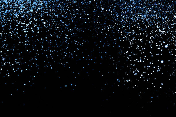 istock Splash of blue sparkles 1195481768