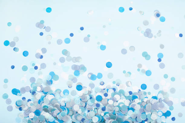 istock Colorful festive confetti scrattered on blue pastel background. 1195481781
