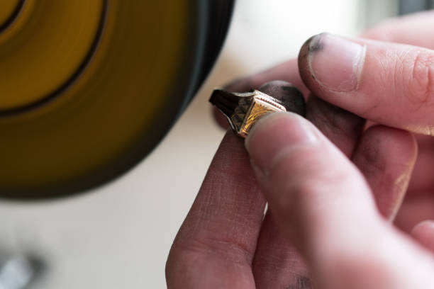 istock Close-Up Of Jewelry Hands Maker Using Polishing Machine 1195481903