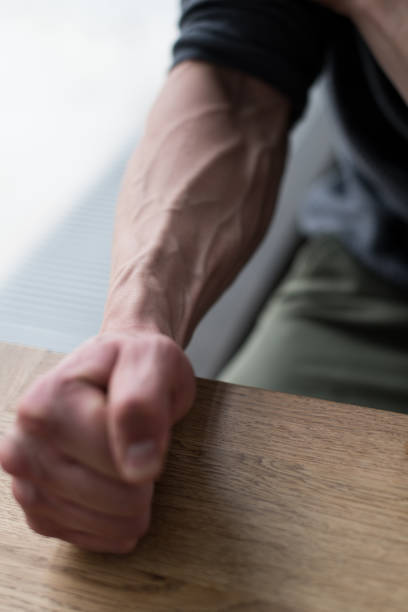 istock Man Showing Vascularity Hand Close Up 1195482057
